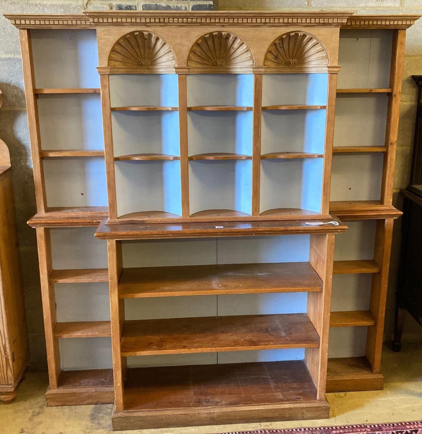 A pine breakfront open bookcase, width 172cm height 176cm